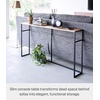 image:imageYAMAZAKI Home Tower Long Console Table for Entryway Or Hallways Narrow Behnd Sofa Table with Wooden Top  Long console table perfect for entryways or hallways Features a beautiful wooden top and a functional lower metal shelfBlack