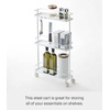 image:imageYAMAZAKI Home Tower Rolling Kitchen Island Three Tier Metal Storage Cart  Portable Organizer Shelves Utility Cart 26  Steel   Threetier metal storage cart serves as a rolling kitchen island Builtin wheels ensure smooth mobility for easy transportWhite