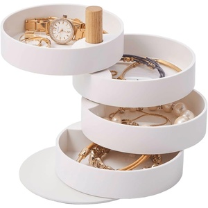 image:imageYAMAZAKI Home Rotating Jewelry Organizer 4Tier Storage Box Stacked Accessory Trays With Wooden Dowel  Small  Plastic  Wood  Rotating 4tier storage box with stacked accessory trays Plastic and wood construction featuring an elegant wooden dowelWhite