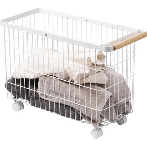 image:imageYamazaki Home Compact Rolling Laundry Cart Wire Hamper with Wheels White  Compact rolling laundry basket cart features a metal hamper with wheels and a handle for easy mobility Keeps items tidyWhite