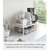 image:imageYAMAZAKI Home Tower Expandable Support Rack  Kitchen Storage Shelf Organizer  Small  Steel  Expandable support rack designed to maximize kitchen storage Ideal for organizing cabinets and pantries Easy to assembleWhite
