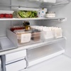 image:imageYamazaki Home Fridge Produce Organizer Bin with Adjustable Divider White  Wide refrigerator organizer bin serves as a produce washer and storage solution Easy to clean Keeps essentials organizedOne Size