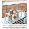 image:imageYAMAZAKI Home Kitchen Rack  Counter Storage Shelf Organizer Steel  WoodWhite  Tosca singletier riser maximizes space Perfect for organizing spices plates or mugs Adds practical everyday storageKitchen Rack Wide