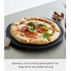 image:imageYamazaki Home Tower Round Cutting Board  Magnetic Mounting Dishwasher Safe NonSlip Surface  Ideal for Pizza and Ingredient Prep  PolypropyleneBlack